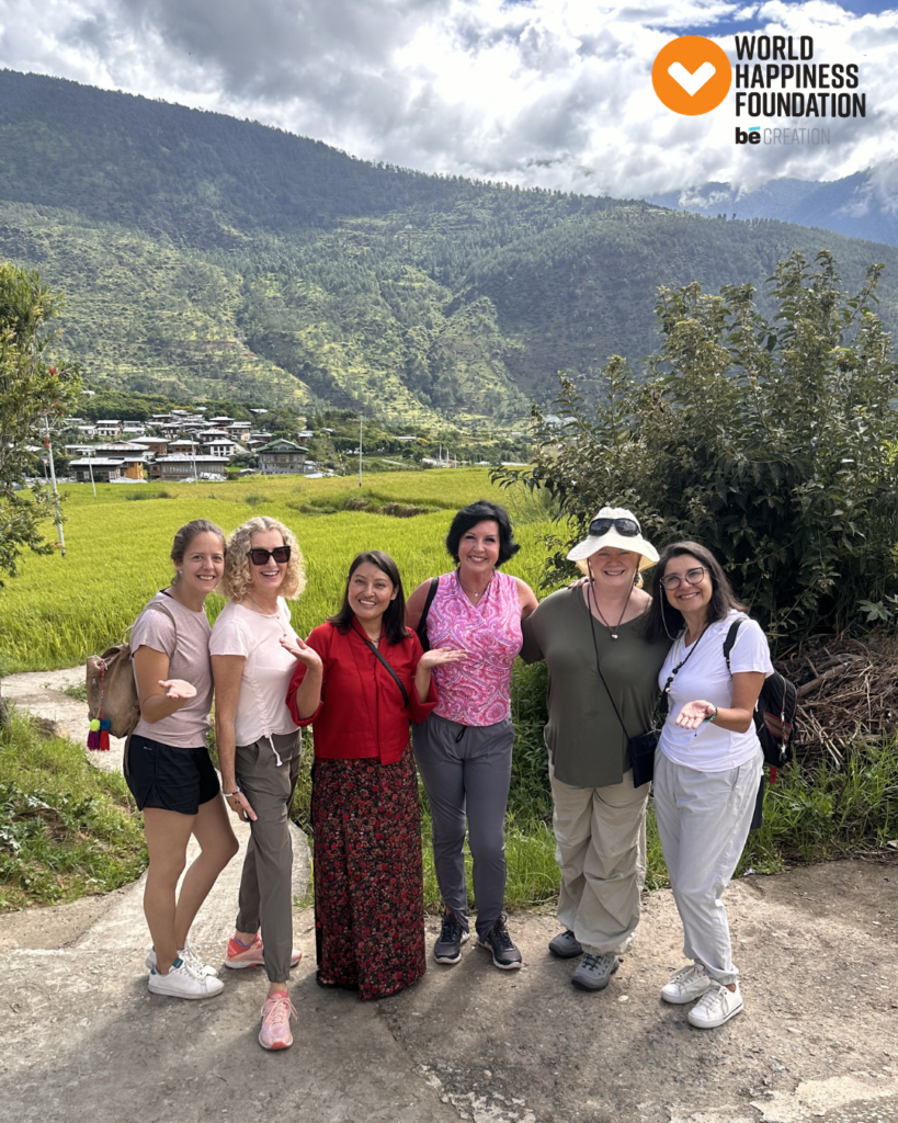 Expedition travellers together above the rice terraces